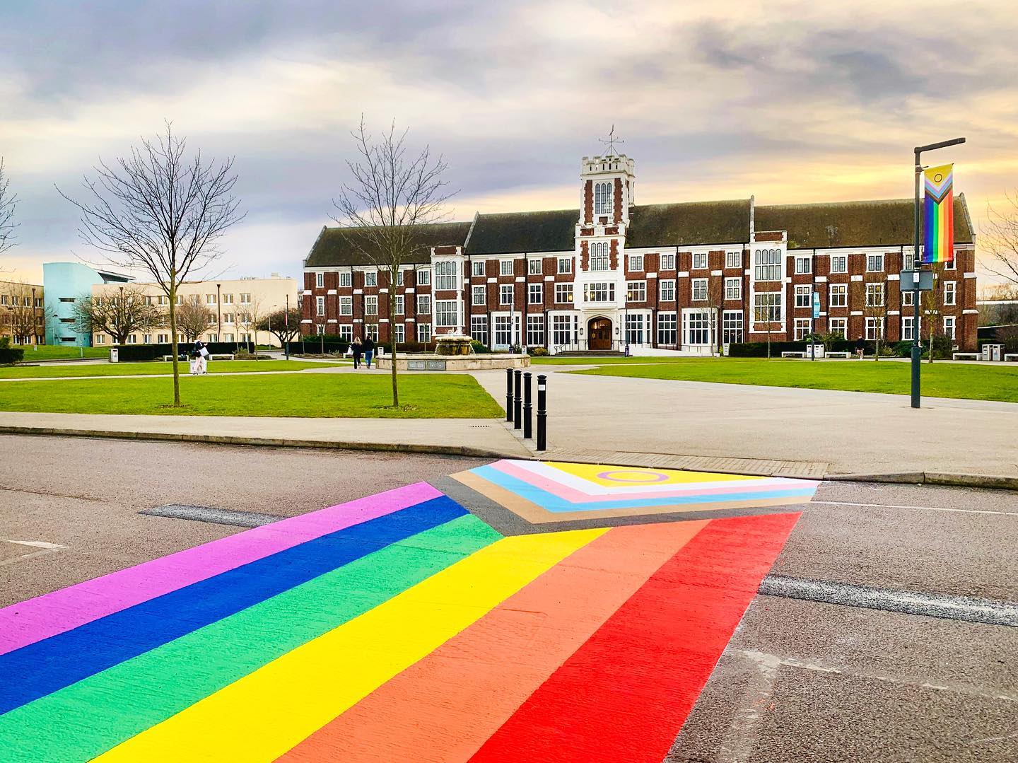 Rainbow crossing outside Hazlerigg building