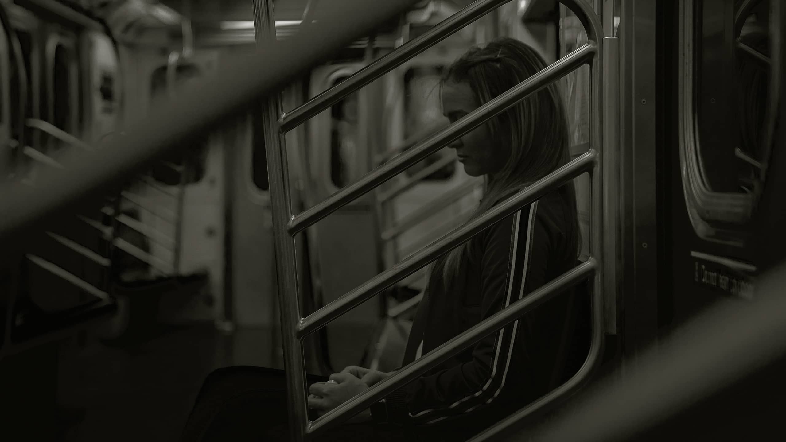 Girl alone on tube train